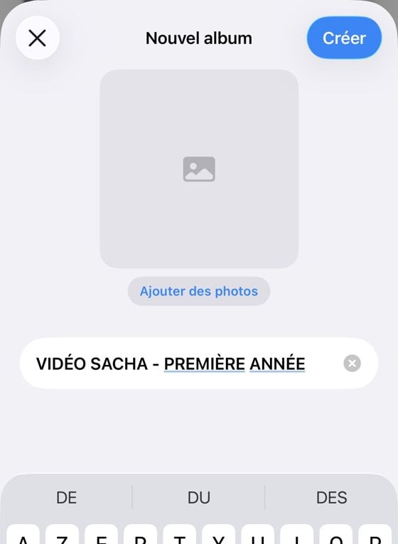 Écran Nouvel album sur iPhone, avec le nom de l'album saisi